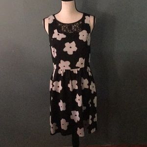 A black dress with a floral print